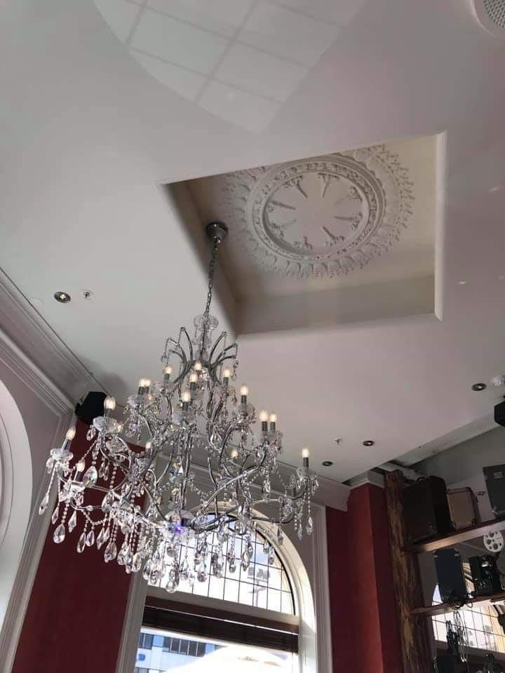 A Chandelier Installed By Someone Who Never Looked Up