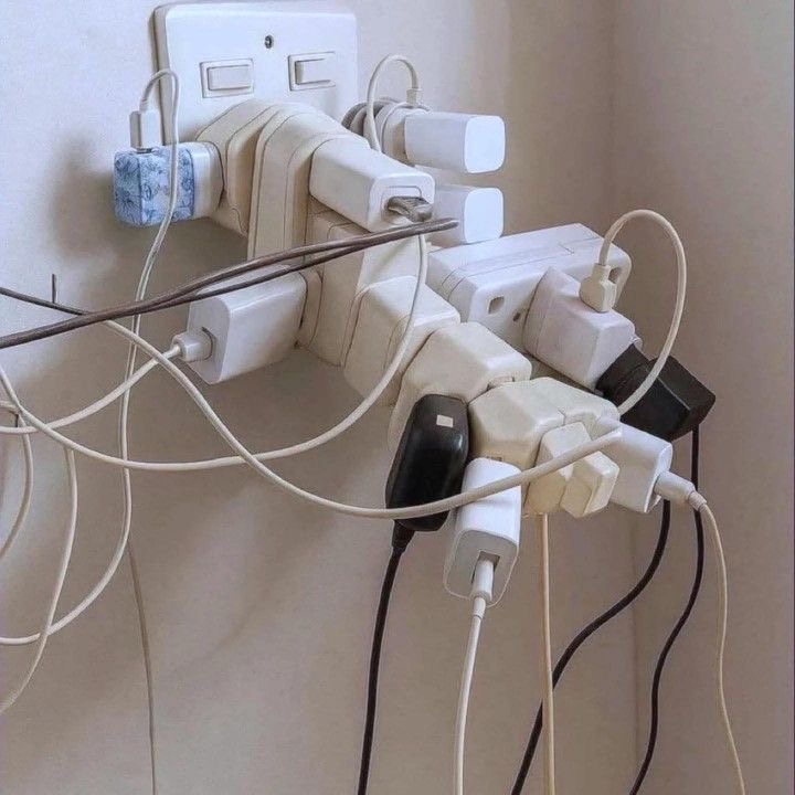 A Thousand Cords Jammed Into One Outlet