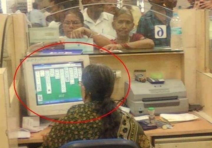 Woman Playing Solitaire at Work