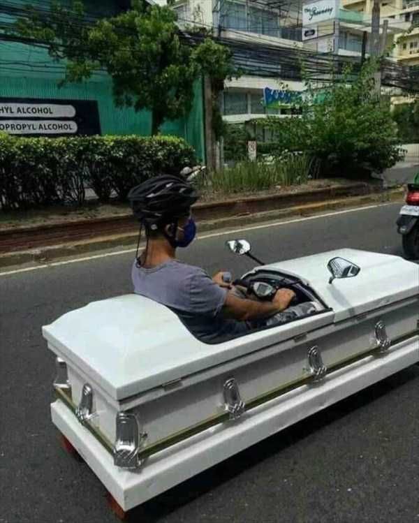 Man Driving… Inside a Coffin