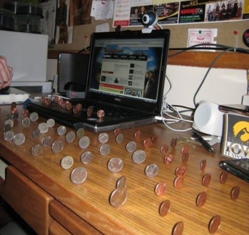 A Bunch of Coins Perfectly Standing Upright