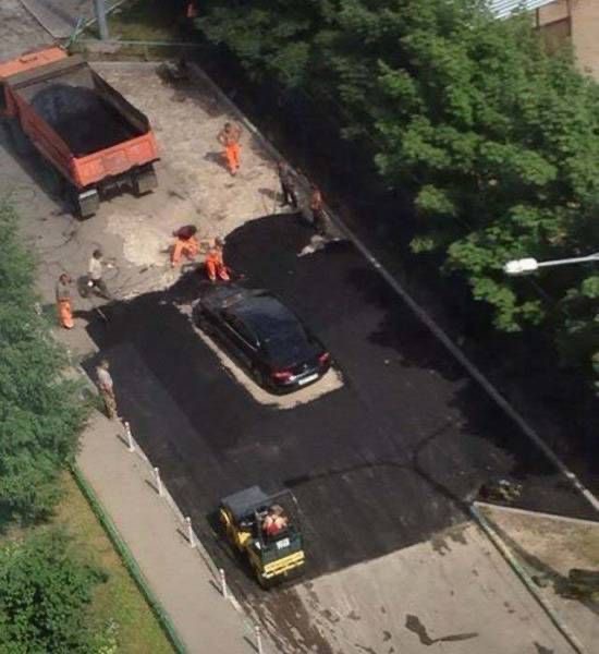 Car Stuck in the Middle of Fresh Wet Cement