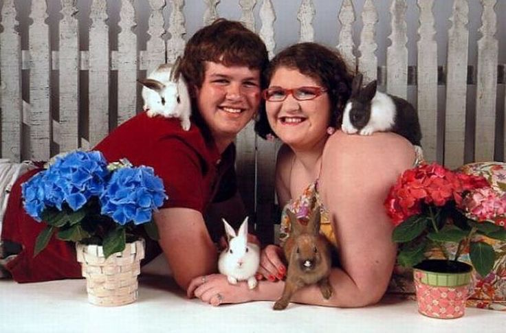 Couple Posing With Bunnies