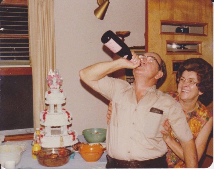 Grandpa Drinking Champagne Straight From the Bottle