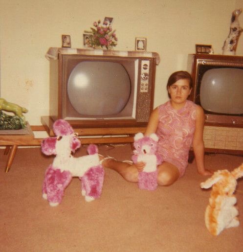 Girl Posing With Stuffed Animals