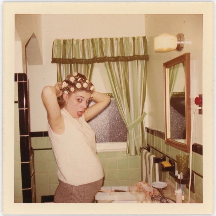 Pregnant Woman With Hot Rollers