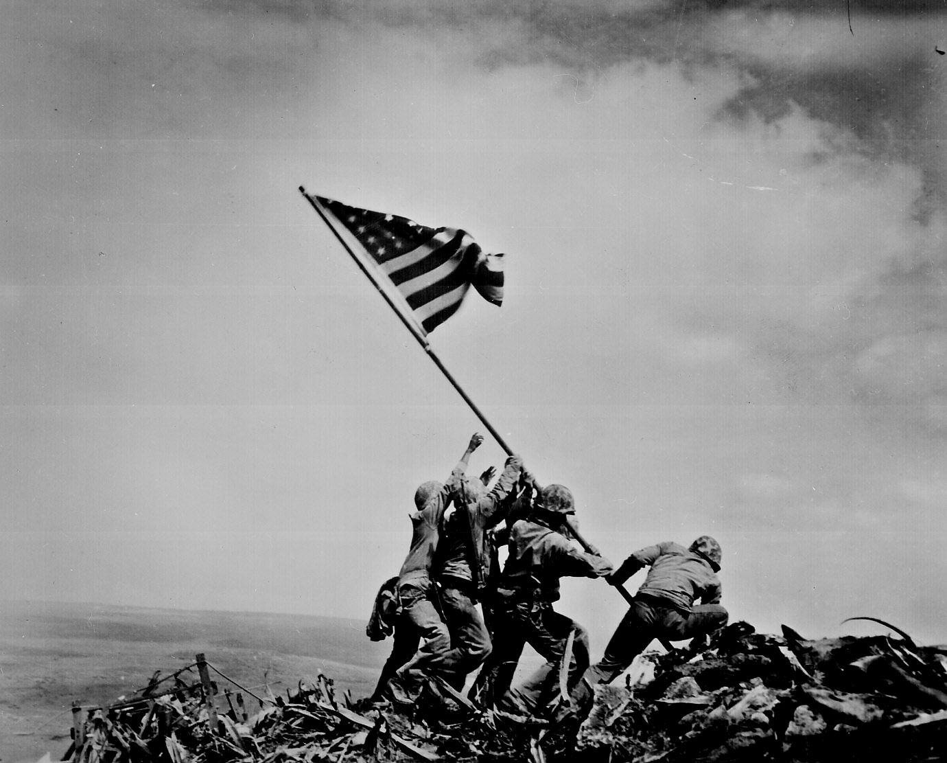 In what year did the flag-raising on Mount Suribachi happened?