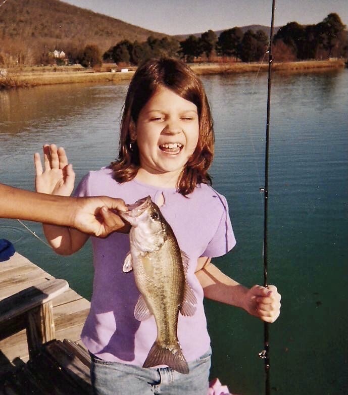 Little Girl Disgusted by a Fish