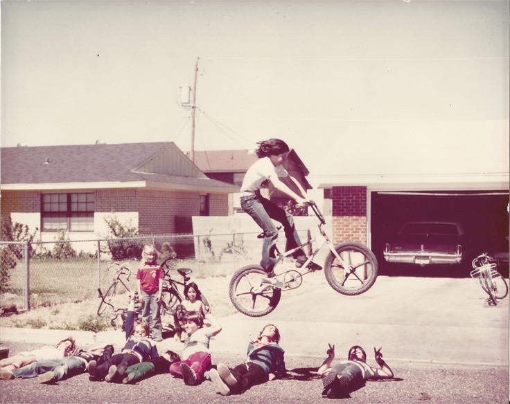 Kid Jumping His Bike Over Friends