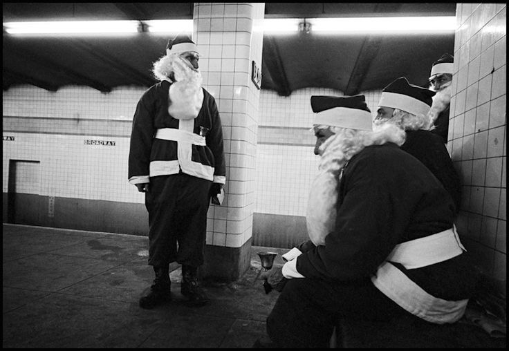 Santas Waiting for the Subway, Probably Regretting Everything