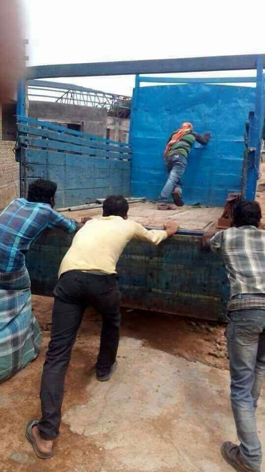 The Truck-Pushing Team