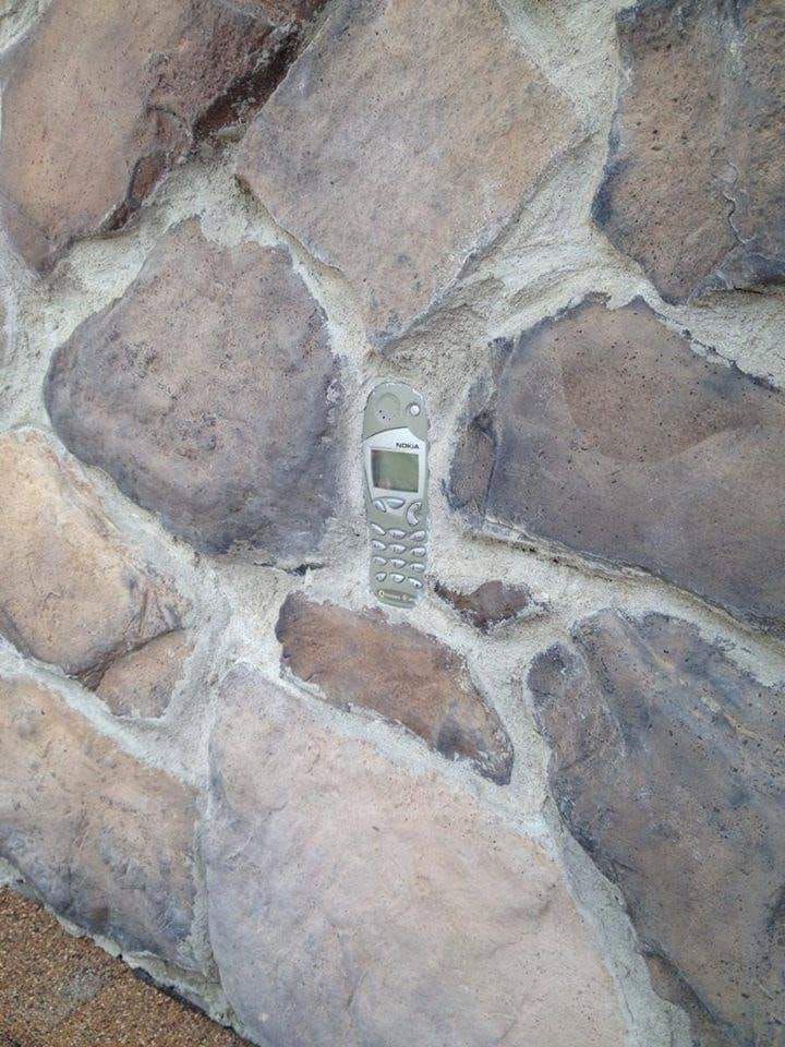 Cellphone Melted Into the Wall