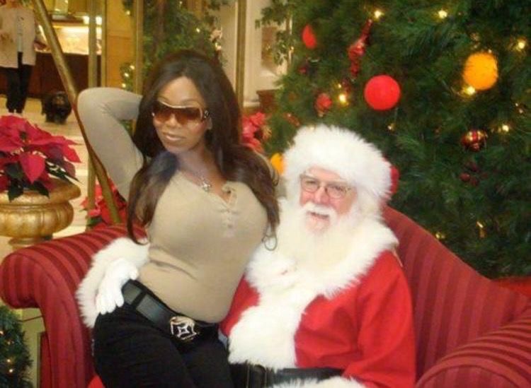 Santa Posing With a Woman