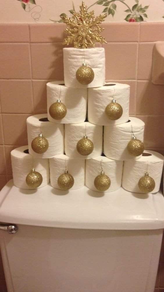Toilet Paper Stacked to Look Like a Christmas Tree