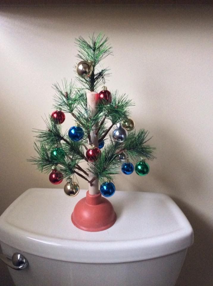Plunger Christmas Tree Sitting on the Toilet