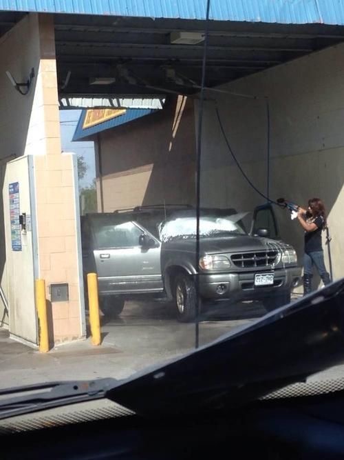 Girl Washes Her Car with the Doors Wide Open