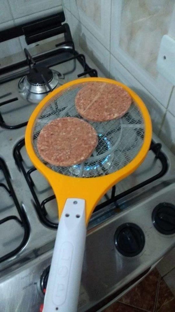 Tennis Racket Used as a Frying Pan for Burgers