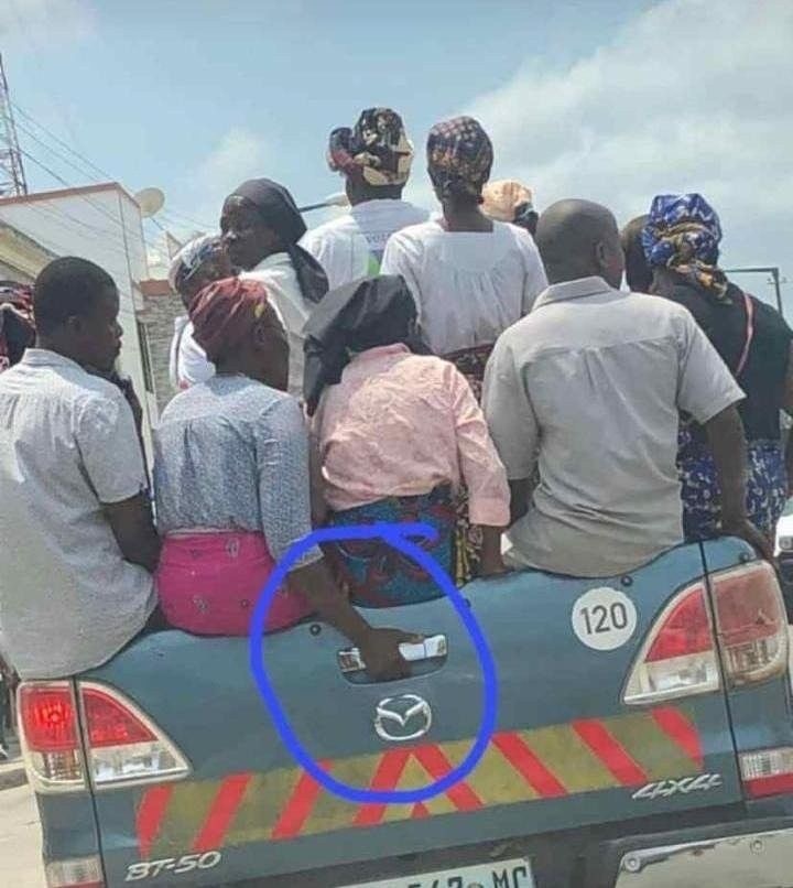 Crowd Rides in the Back of a Truck