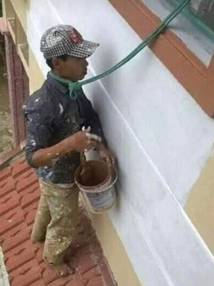 Man Ties Rope Around His Own Neck