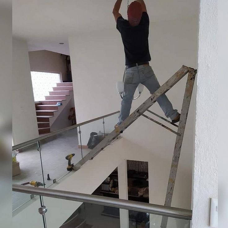 Dangerously Placed Ladder 