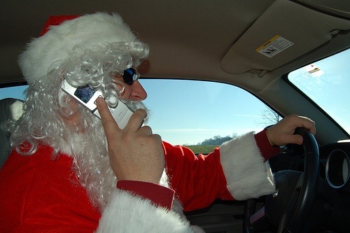 Santa Driving While Talking on the Phone