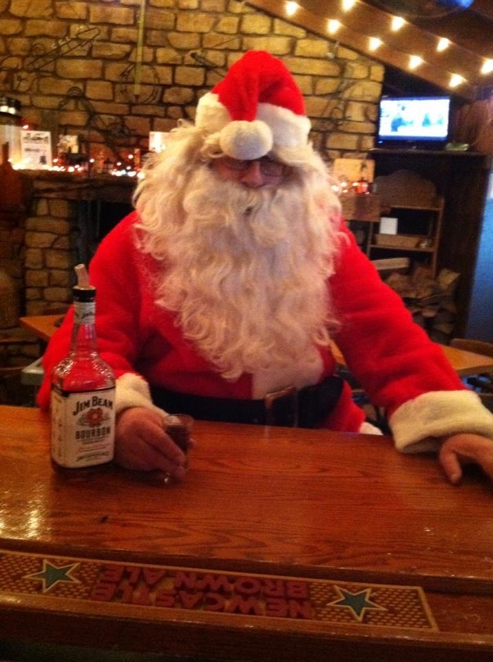 Santa Drinking Whisky at a Bar
