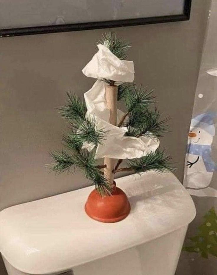 Plunger Christmas Tree With Toilet Paper