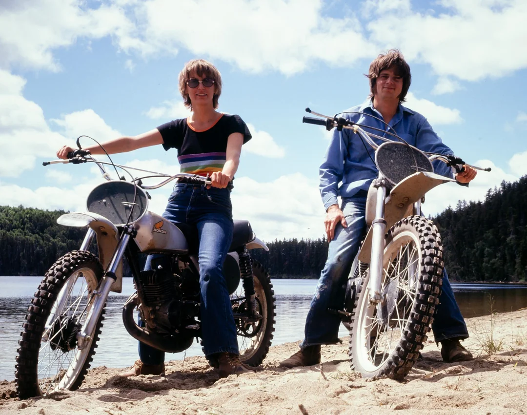 "My parents showing off their bikes"