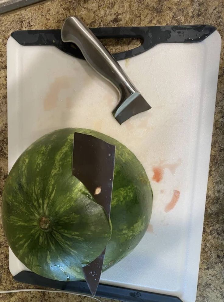 Knife Breaking While Cutting a Watermelon
