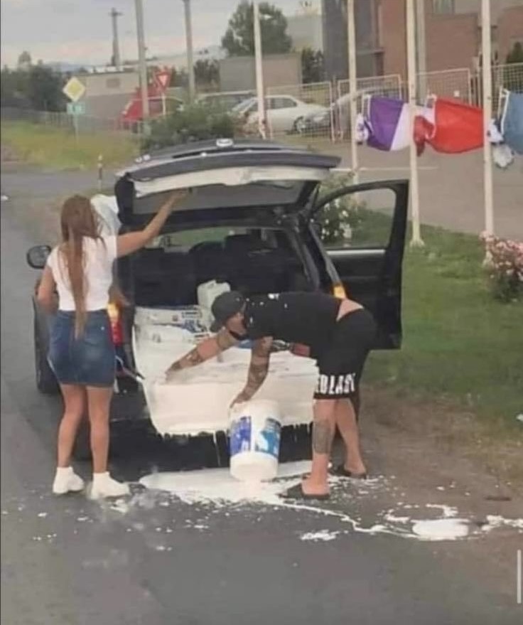 Paint Cans Exploding All Over the Back of a Car