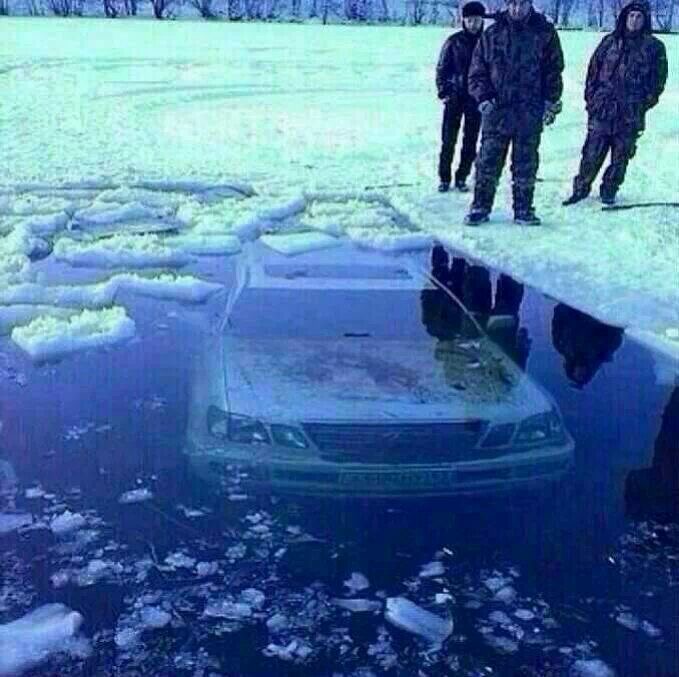 Car Submerged Under Ice-Cold Water