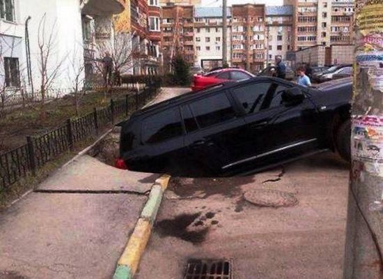 Truck Falling Into a Giant Hole
