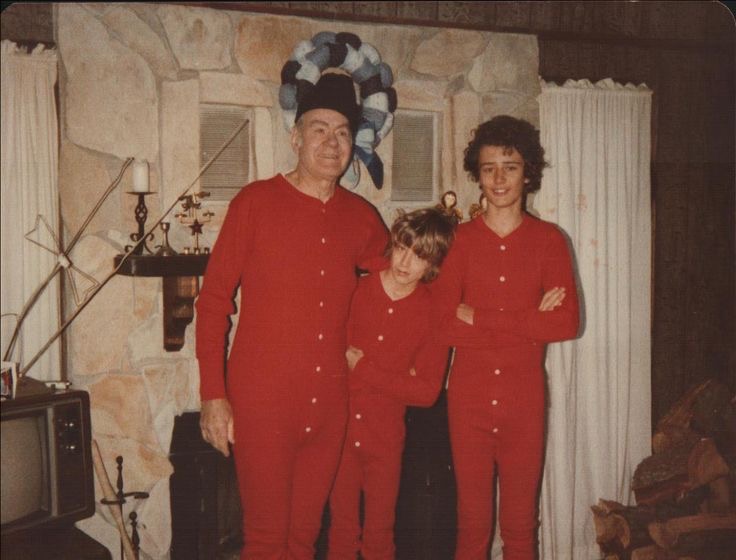 Grandpa and Grandkids Wearing the Same Red One-Piece