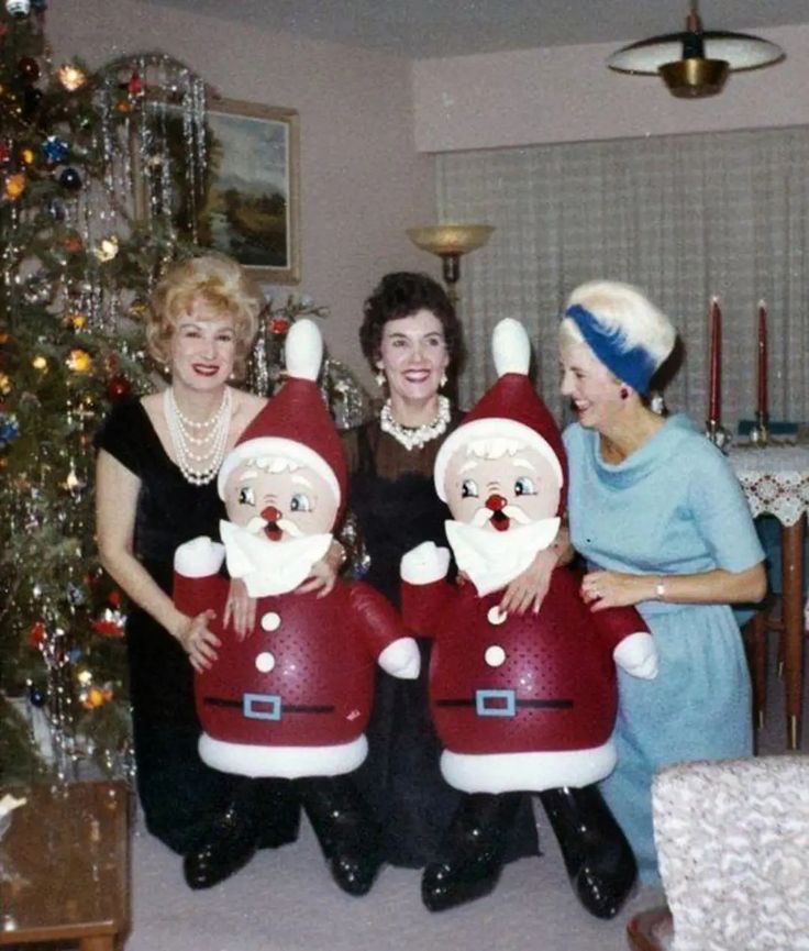 Grandmas Posing with Inflatable Santa Dolls