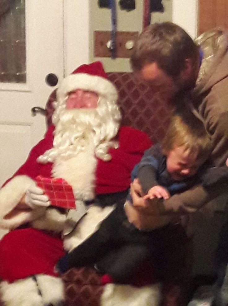 Santa Laughing While a Child Cries