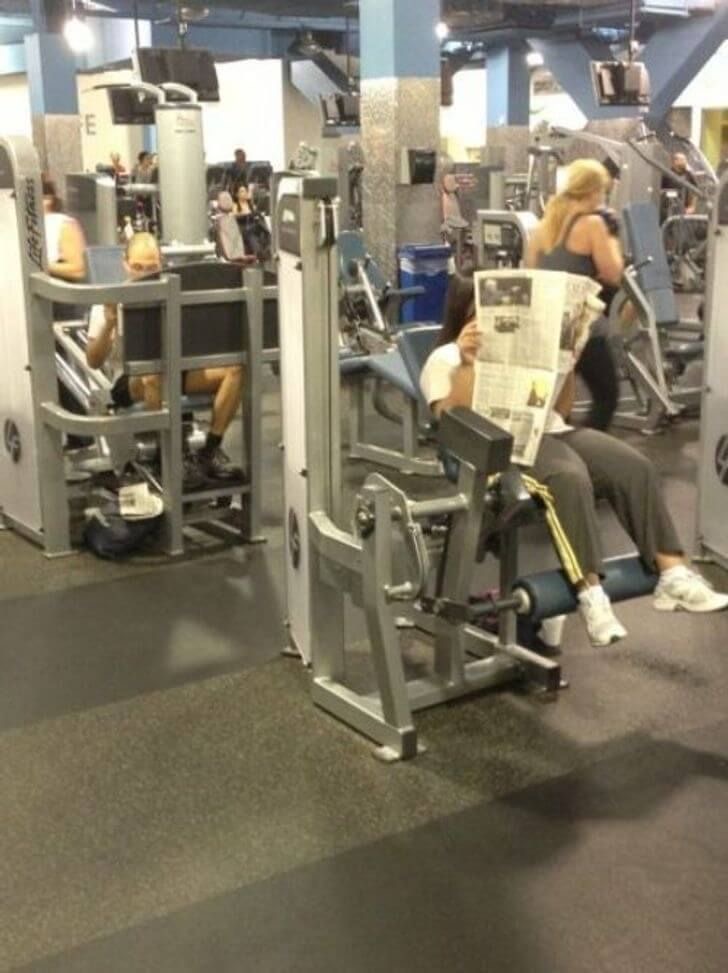 Reading the Newspaper on a Gym Machine