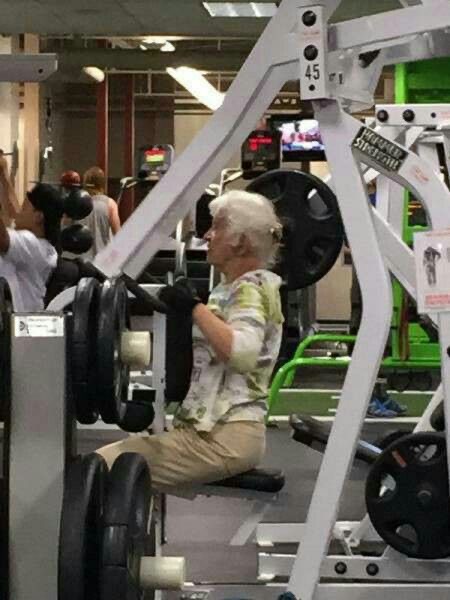 Old Lady Using Gym Machine Wrong