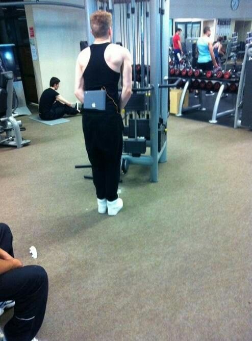 Guy Carrying a Giant iPad on His Back