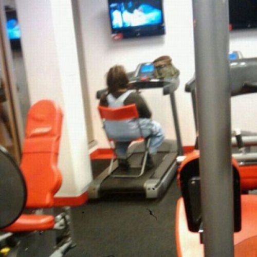 Woman Sitting on a Chair over a Treadmill
