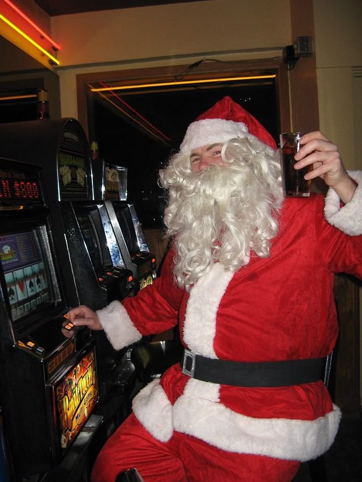Santa Drinking and Playing on a Machine