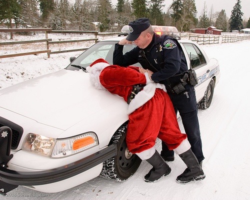 Santa Being Arrested by Police