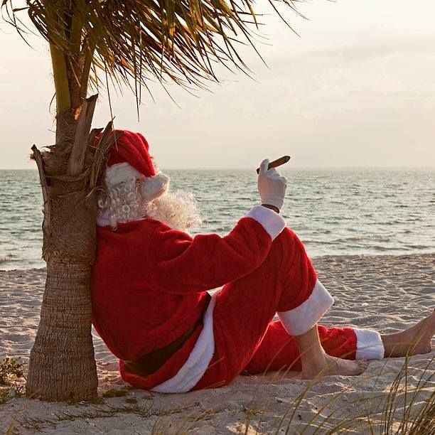 Santa Smoking on the Beach
