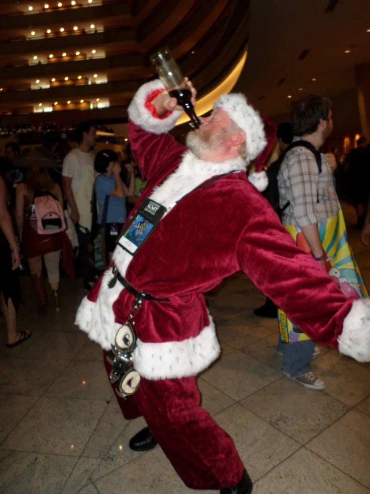 Santa Drinking at a Party