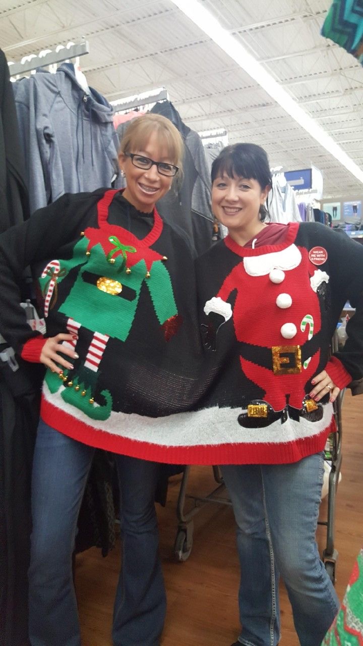 Two Women Wearing One Shared Sweater