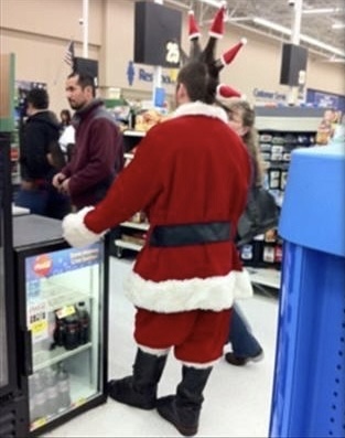 Punk Santa With Tiny Santa Hats in His Hair