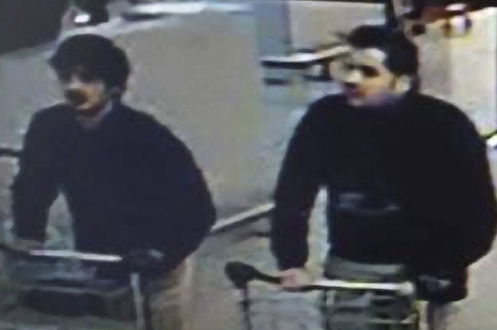 These two men, each wearing a black glove on their left hands are believed to be the suicide bombers.