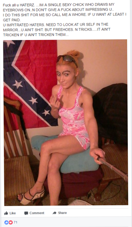 Girl with strange eyebrows taking selfie stick selfie in front of confederate flag.