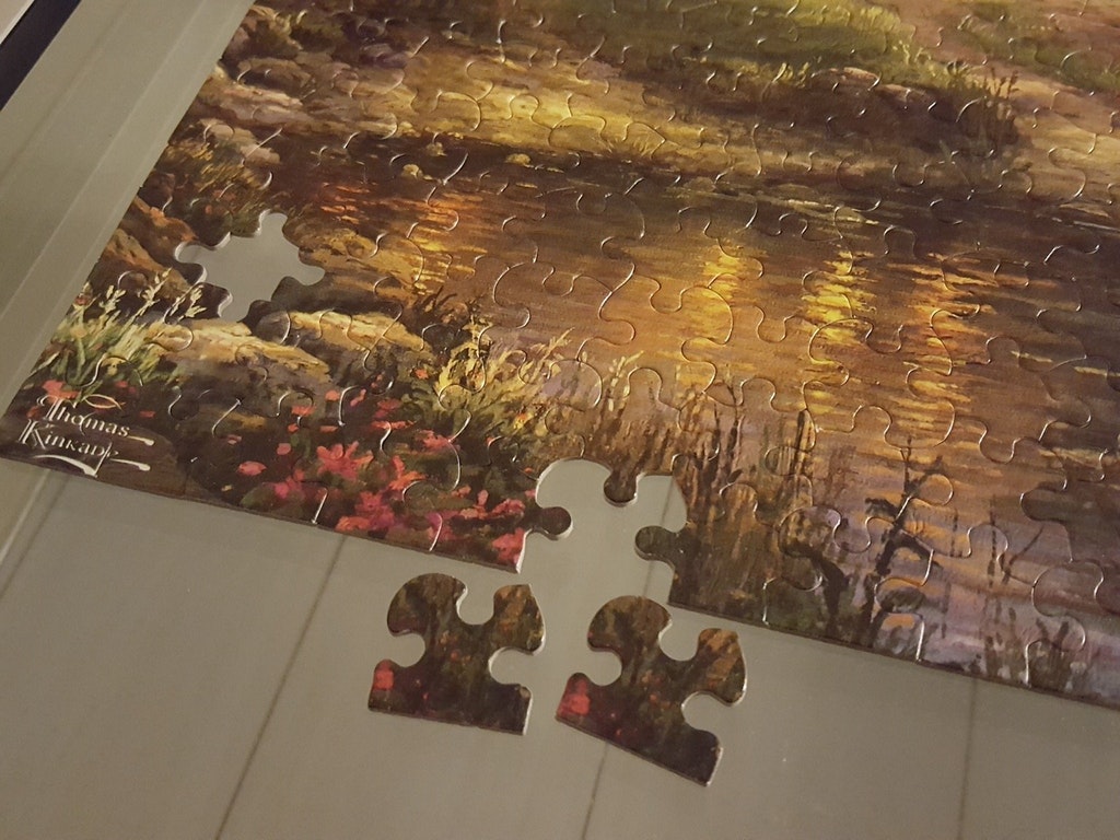 Puzzle which has two identical last pieces and is therefore clearly missing the last piece.