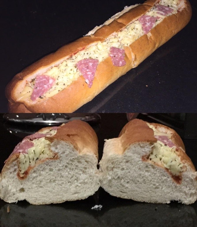 Sandwich that exemplifies what is wrong with humanity, with basically just everything stuffed at the top, not even cutting it open to make 2 separate pieces.