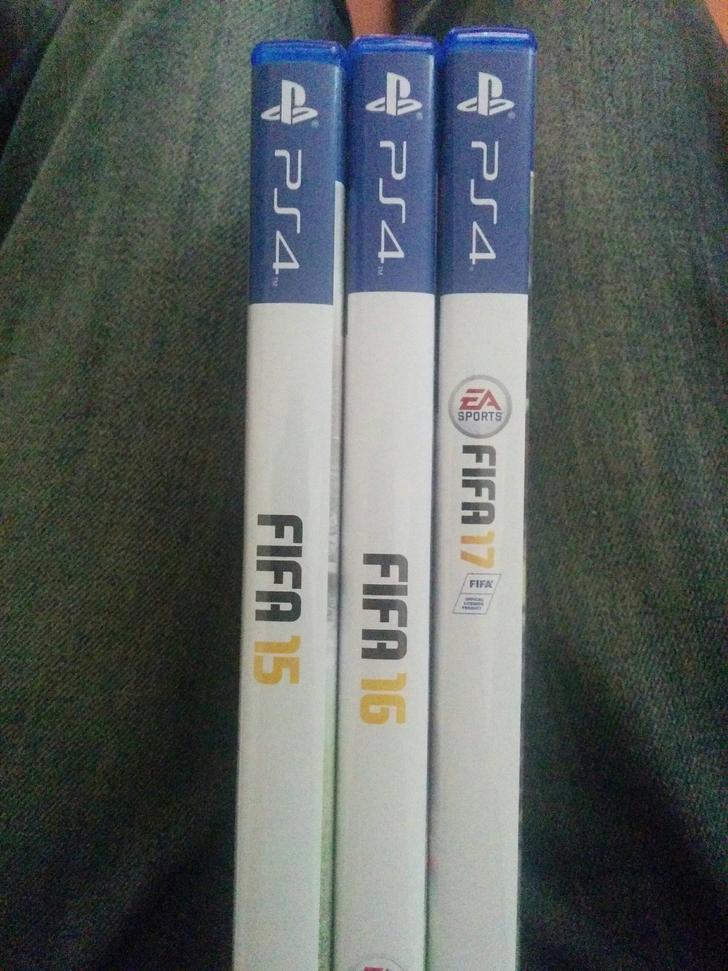 Frustrating changes in the different FIFA PS4 games when mounted in the bookcase side by side.